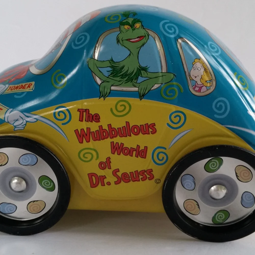 Vintage Dr. Seuss Themed Blue and Yellow Tin Toy Car